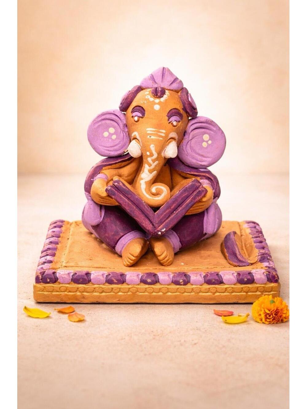 Indian Artisan Handmade 2010s Ganesha Reading Terracotta Figurine, 3x3”